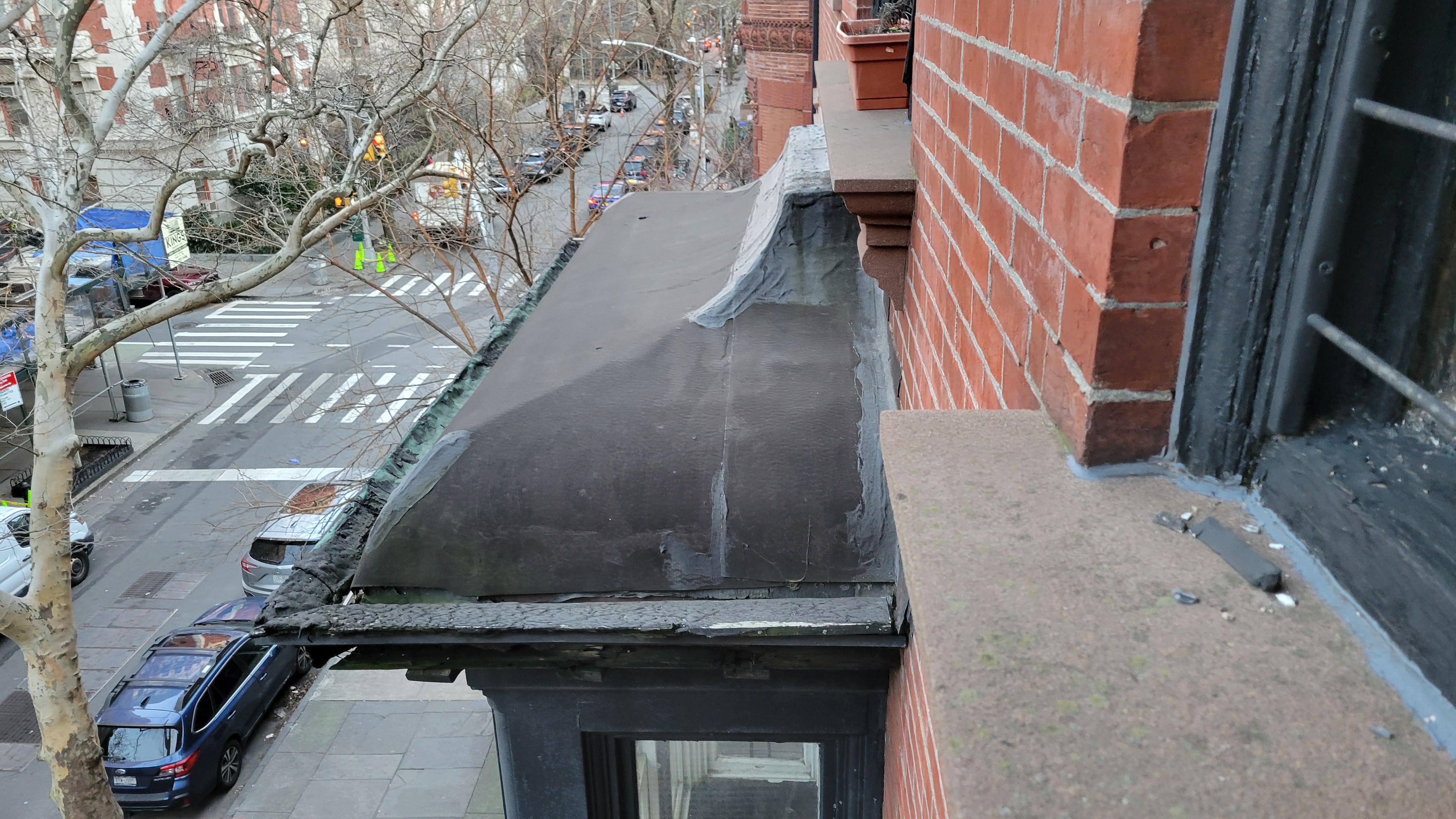 The bay's deteriorated roof membrane, seen from above