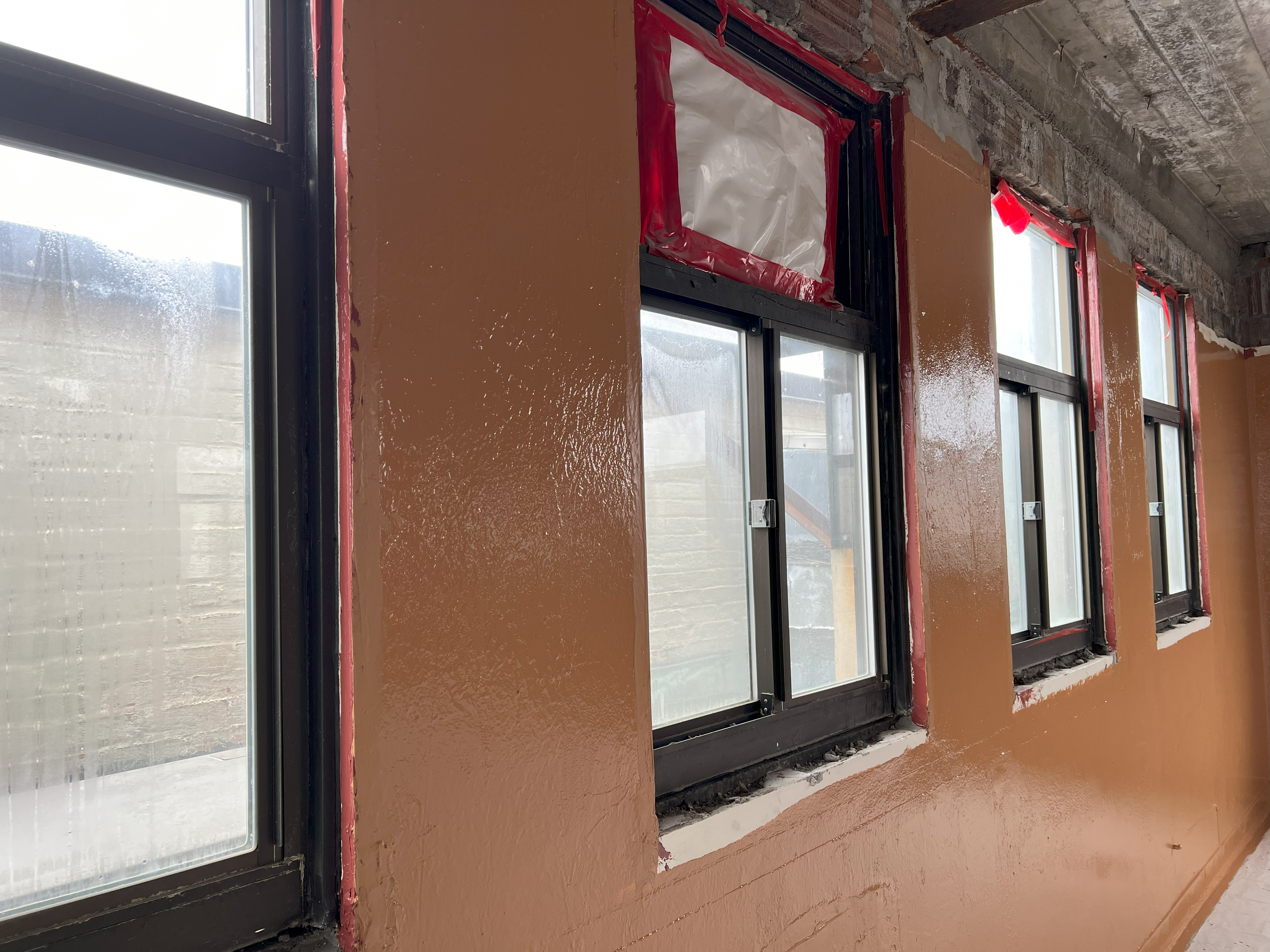 FastFlash and Cat 5 being applied to the negative side of the exterior wall at the Plant and Science building at Cornell University in Ithaca, NY.