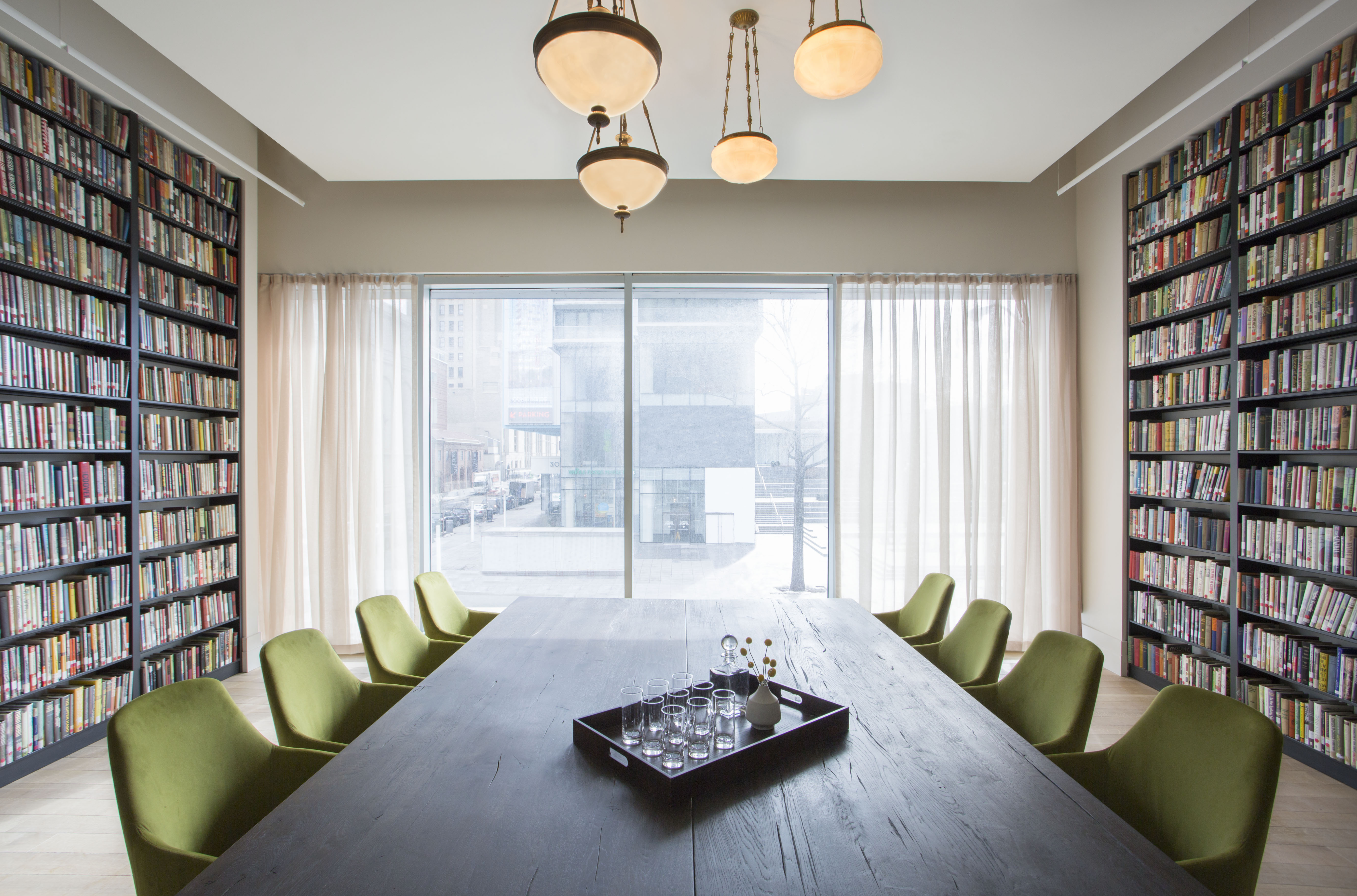 In addition to housing a circulating collection of more than 100,000 fiction titles, the center also contains a bookstore, café, auditorium space for educational programming, a writer’s studio, rooms for discussion groups, and administrative support space.