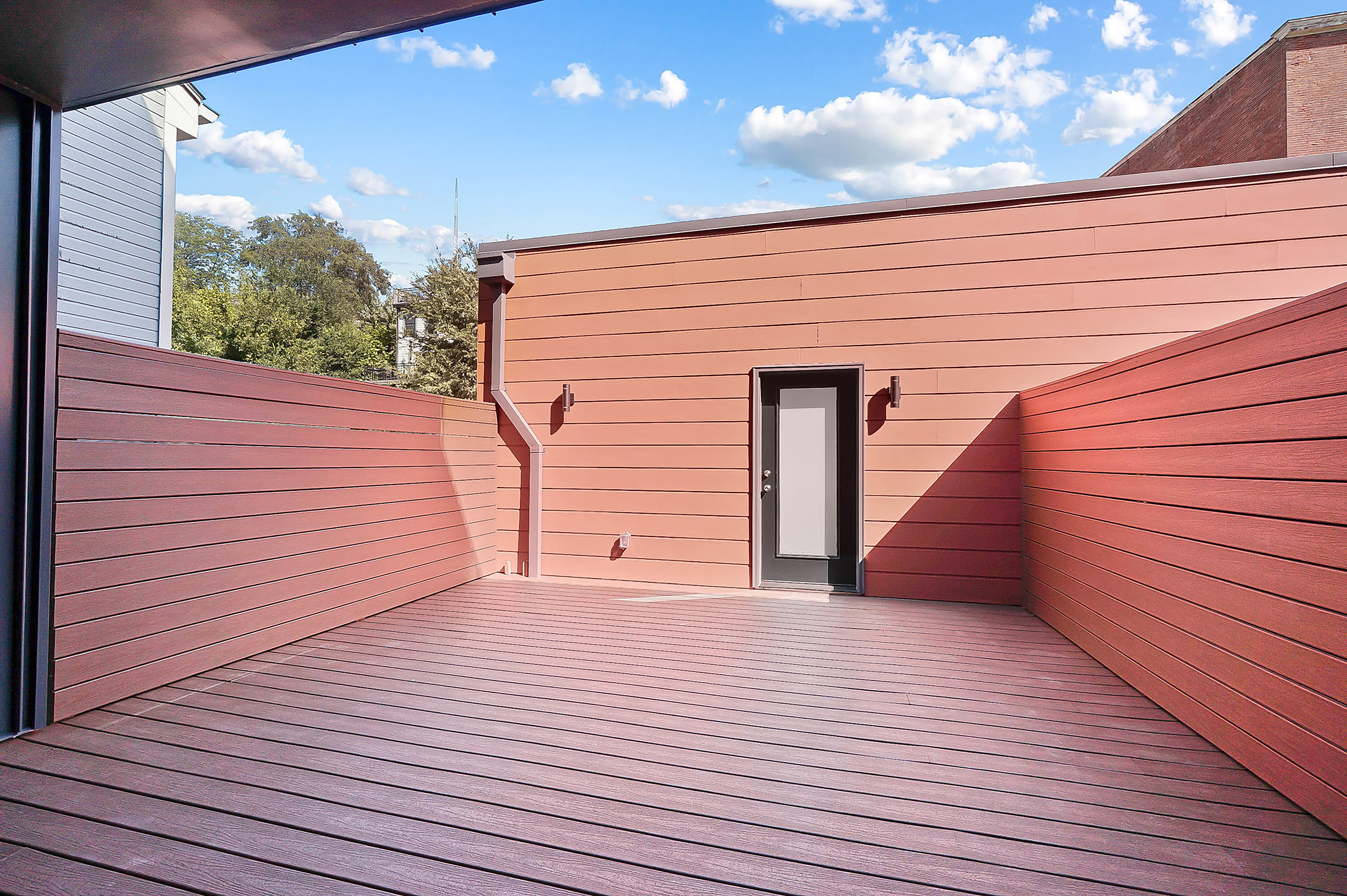 From the kitchen, occupants can walk out to a courtyard space.